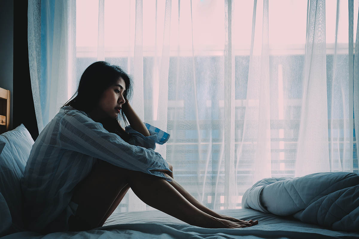 commonly-abused-prescription-drugs woman thinking about commonly abused prescription drugs