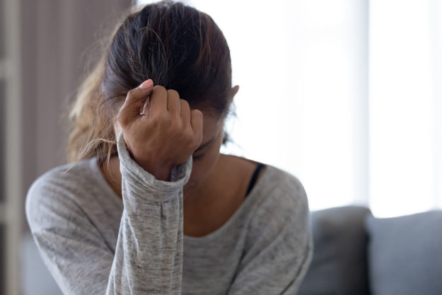 woman thinking about drinking and social media