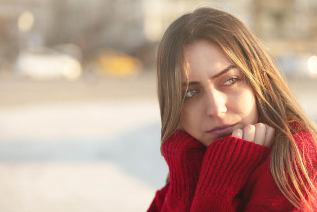 woman thinking about opioids vs opiates