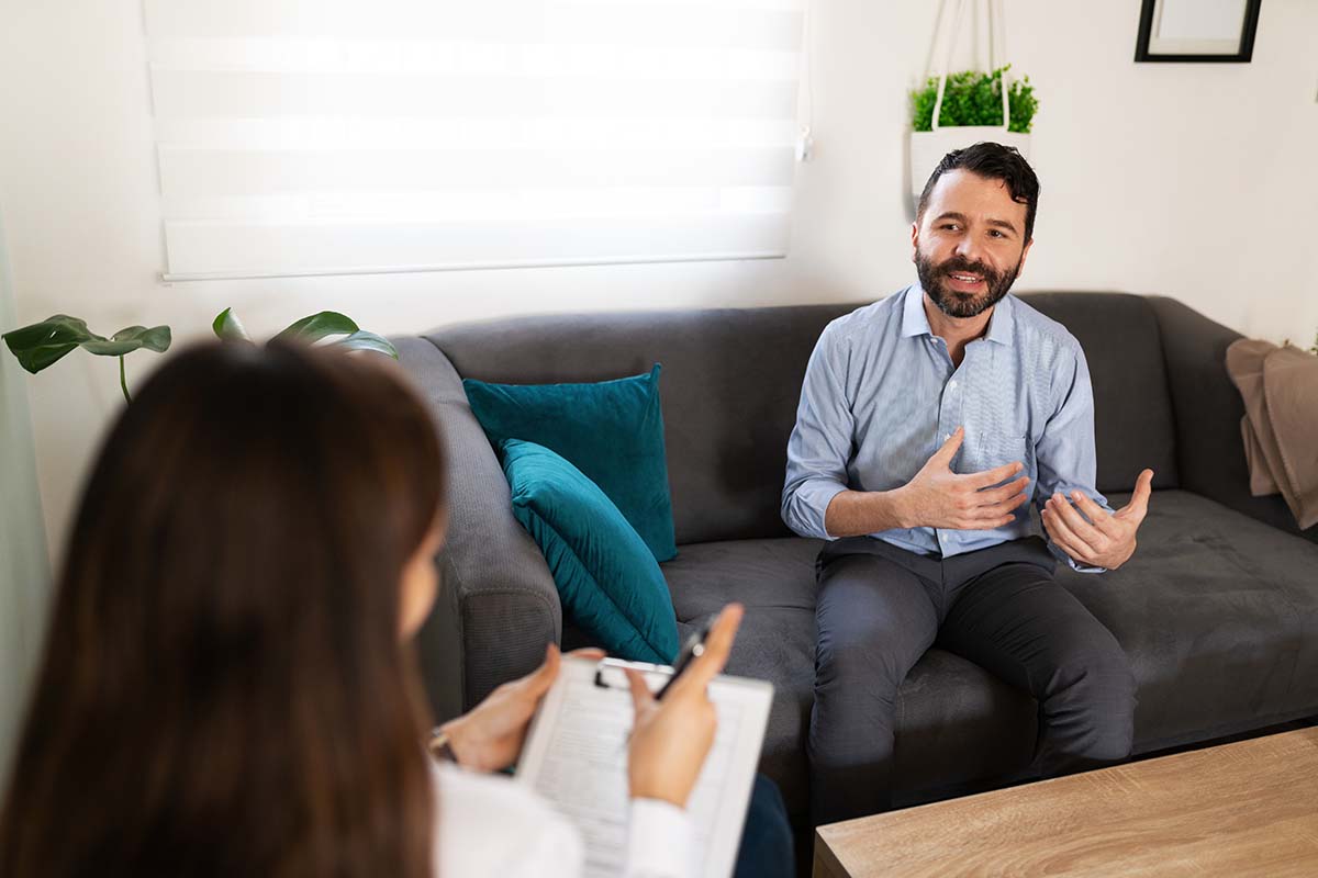 rehab center with commercial insurance man in a rehab center talking about commercial insurance